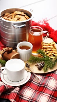 A table topped with plates of food and cups of tea