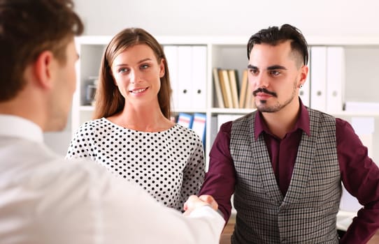 A married couple at a clinic reception, close-up. Reproductive medicine, preparation for conception, consultation