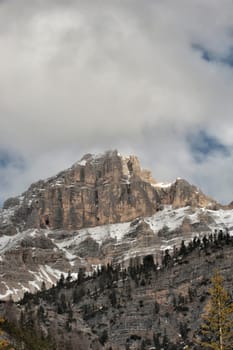 Dolomites view on cloudy sky background