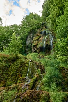 Urach Waterfall in Baden-Wurttemberg, Germany During Summer. Urach Waterfall in Baden-Wurttemberg, Germany During Summer.