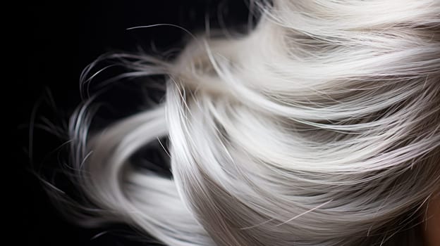 A close up of a woman's hair with white highlights