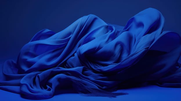 A blue cloth is wrapped around a person's body