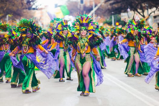 Badajoz, Spain, sunday. February 13 2024. Carnival parade through the streets of Badajoz