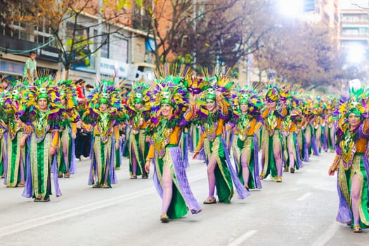 Badajoz, Spain, sunday. February 13 2024. Carnival parade through the streets of Badajoz