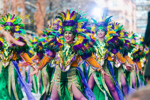 Badajoz, Spain, sunday. February 13 2024. Carnival parade through the streets of Badajoz