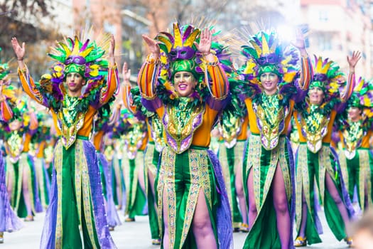 Badajoz, Spain, sunday. February 13 2024. Carnival parade through the streets of Badajoz