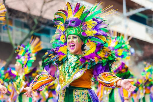 Badajoz, Spain, sunday. February 13 2024. Carnival parade through the streets of Badajoz