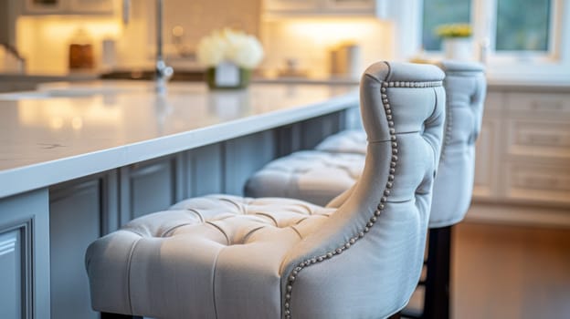 A row of white chairs sitting in front a kitchen counter