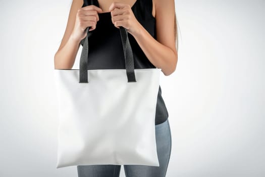 woman Hand holding a White Polyester square tote bag for mockup . AI generated image.