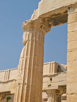 Greek history, ancient pillar or city with keystone arch, architectural detail for tourist attraction site. Traditional, outdoor or crumbling stone of temple building for culture in Acropolis Greece.