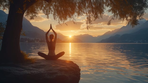 A woman sitting on a rock in the water doing yoga