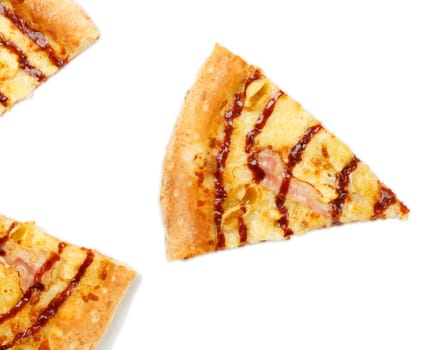 Slices of italian bacon pizza over white isolated background.
