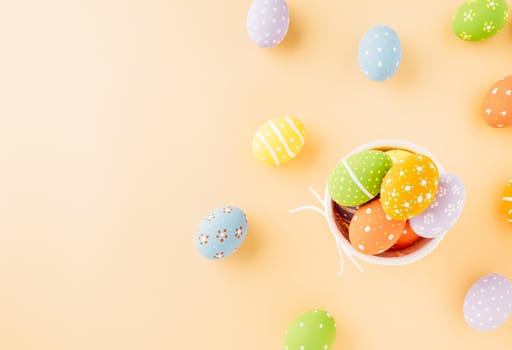 Colorful easter eggs isolated on pastel background with copy space, Funny decoration, Creative composition banner web design holiday background, Happy Easter Day greeting card, flat lay top view