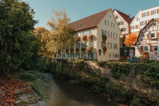 Old national German town house. Old Town is full of colorful and well preserved buildings. Baden-Wurttemberg is a state in southwest Germany bordering France and Switzerland. The Black Forest, known for its evergreen scenery and traditional villages, lies in the mountainous southwest. Stuttgart, the capital, is home to Wilhelma, a royal estate turned zoo and gardens. Porsche and Mercedes-Benz have headquarters and museums there. The 19th-century Hohenzollern Castle sits in the Swabian Alps to the south.