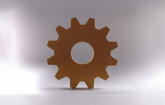 Golden detail of gear wheel of mechanism lying on gray background closeup. Repair of mechanical products concept