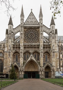 London, UK -​ Dec 25, 2023 - Exterior Architecture of The gothic Westminster Abbey (The Collegiate Church of St Peter at City of Westminster) is Traditional place of coronation and burial site for English monarchs, Space for text, Selective focus.