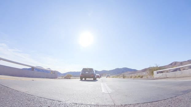 HWY 15, California, USA-December 3, 2022-Embarking on a road trip from Nevada to California, driving on Highway 15 during the day offers scenic views and an exciting journey between states.