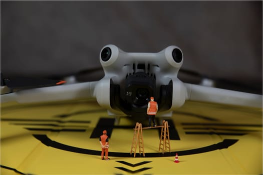 man checking the working of the video and photo camera drone