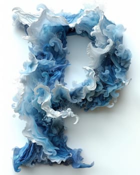 A letter made out of blue and white paper floating on the sea.