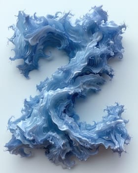 A piece of blue paper carefully arranged to resemble the letter S.