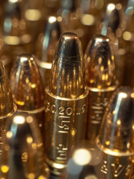 A detailed view of numerous bullet shells, showcasing their distinctive shape and markings.