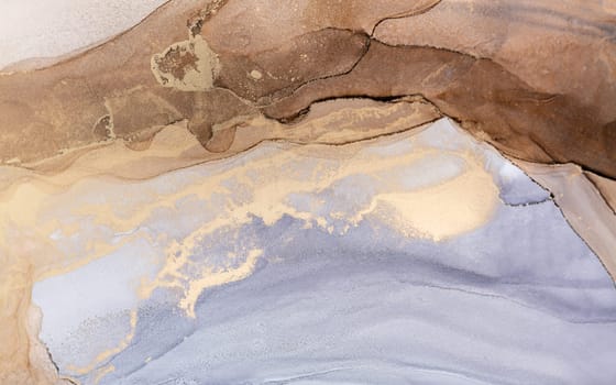 Tender and dreamy design. Luxury abstract fluid art painting in alcohol ink technique, mixture of bronze, silver, metallic and gold paints. Imitation of marble stone cut, glowing golden veins.