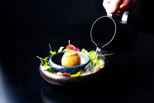 Closeup of some spanish croquettes in bed of lettuce served as tapas