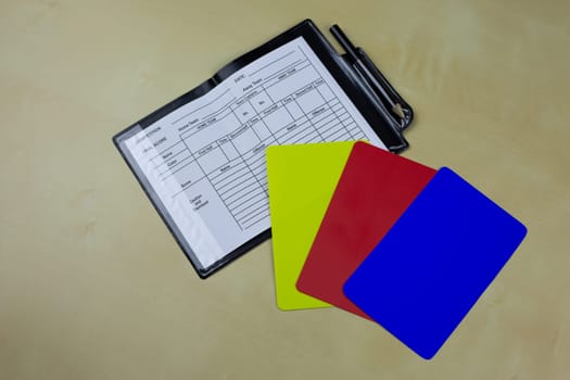 New set of soccer referee cards with blue card to change the rules in football, notepad for substituting players on the field