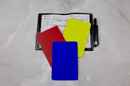 Blue card in football, set of referee cards of three different colors, changes in football regulations, new rules with blue card