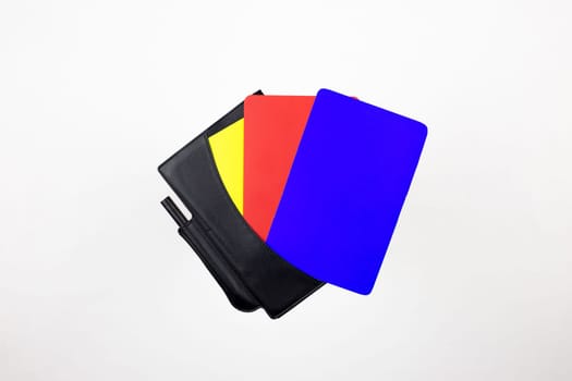 Soccer referee set for chest pocket with blue, red, yellow card, isolated on white background, blue card in football