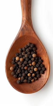 Top view wooden spoon with black pepper, isolated on white background.