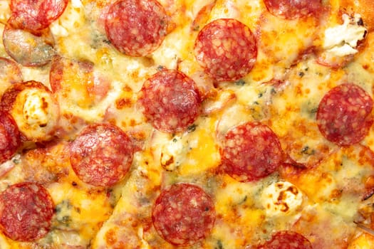 Background with delicious classic italian Pizza Pepperoni with sausages and cheese mozzarella. Fresh italian classic original pepperoni pizza.
