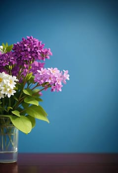 bouquet of different blooming spring lilacs in a vase isolated on blue background. AI generated image.