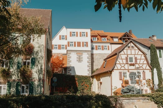 Old national German town house. Old Town is full of colorful and well preserved buildings. Baden-Wurttemberg is a state in southwest Germany bordering France and Switzerland. The Black Forest, known for its evergreen scenery and traditional villages, lies in the mountainous southwest. Stuttgart, the capital, is home to Wilhelma, a royal estate turned zoo and gardens. Porsche and Mercedes-Benz have headquarters and museums there. The 19th-century Hohenzollern Castle sits in the Swabian Alps to the south.