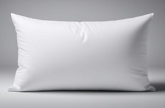 One white rectangular pillow separately on a gray background. Side view.
