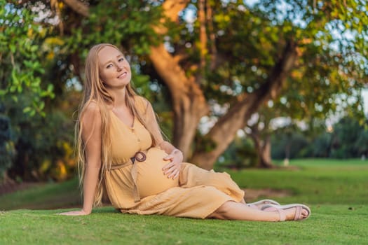 pregnant woman finds joy and serenity, relishing a tranquil moment outdoors during her pregnancy journey.