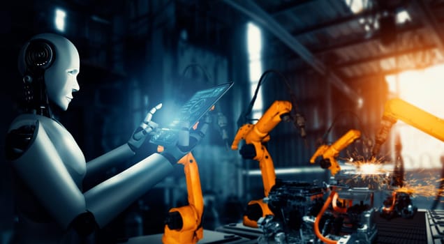 XAI Mechanized industry robot and robotic arms for assembly in factory production. Concept of artificial intelligence for industrial revolution and automation manufacturing process.