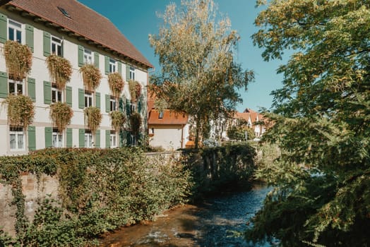 Old national German town house. Old Town is full of colorful and well preserved buildings. Baden-Wurttemberg is a state in southwest Germany bordering France and Switzerland. The Black Forest, known for its evergreen scenery and traditional villages, lies in the mountainous southwest. Stuttgart, the capital, is home to Wilhelma, a royal estate turned zoo and gardens. Porsche and Mercedes-Benz have headquarters and museums there. The 19th-century Hohenzollern Castle sits in the Swabian Alps to the south.