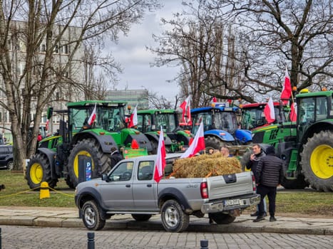 Wroclaw, Poland, February 15, 2024: Farmers protest against the European Union's anti-agricultural policies. Hundreds of agriculture tractors lined up in Wroclaw