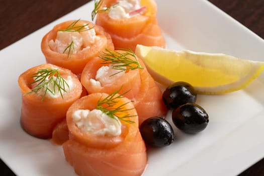 Image of salmon rolls with spicy sauce, close-up