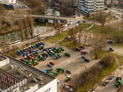 Wroclaw, Poland, February 15, 2024: Collected agricultural machinery at farmers' protest. Farmers' strike in front of the voivodeship office, view from above