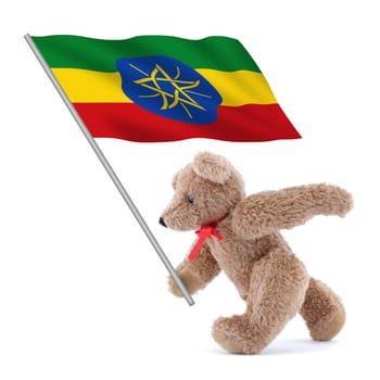 An Ethiopia flag being carried by a cute teddy bear