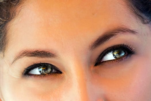 Detail of Grey eyes of beautiful latina woman
