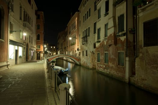 venice canals night view with light reflections