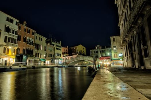 venice canals night view with light reflections