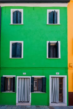 colorful houses of Burano Venice on sunny day