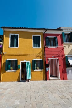 colorful houses of Burano Venice on sunny day