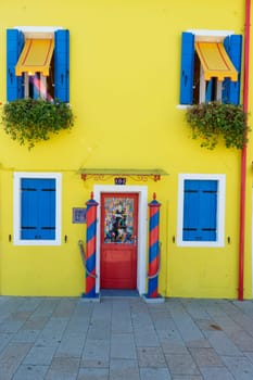 colorful houses of Burano Venice on sunny day