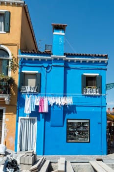 colorful houses of Burano Venice on sunny day