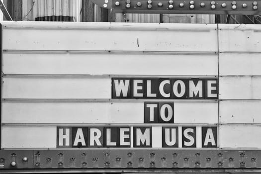 Welcome to harlem Usa Sign in black and white